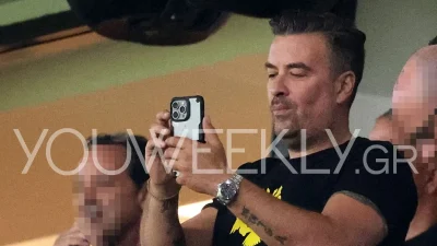 Γιάννης Αϊβάζης: Δεν είχαν καταλάβει ότι τους τραβούσε η κάμερα - Με την Ισμήνη στο γήπεδο της Νέας Φιλαδέλφειας με τη φανέλα της ΑΕΚ