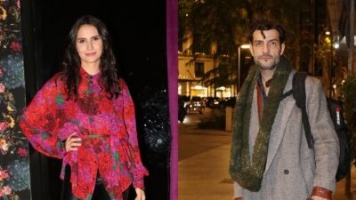 Η Μελίνα Κόντη με φλοράλ πουκάμισο και ο Νίκος Κουρής με παλτό και κασκόλ
